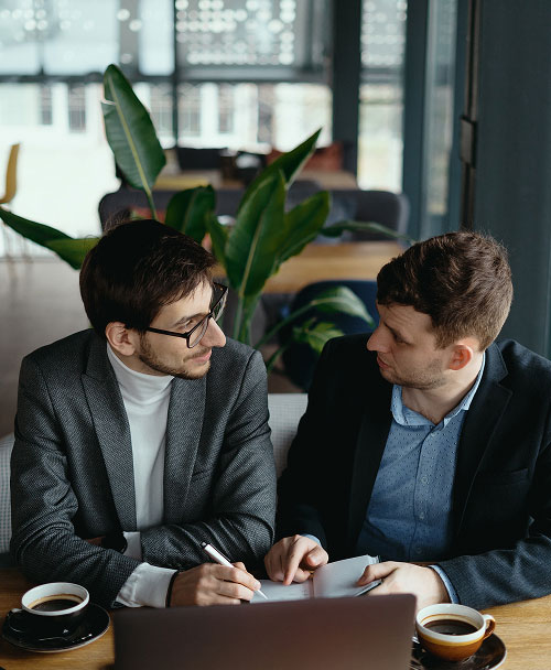 Couple reviewing a home-loan proposal with a Tarsariya advisor